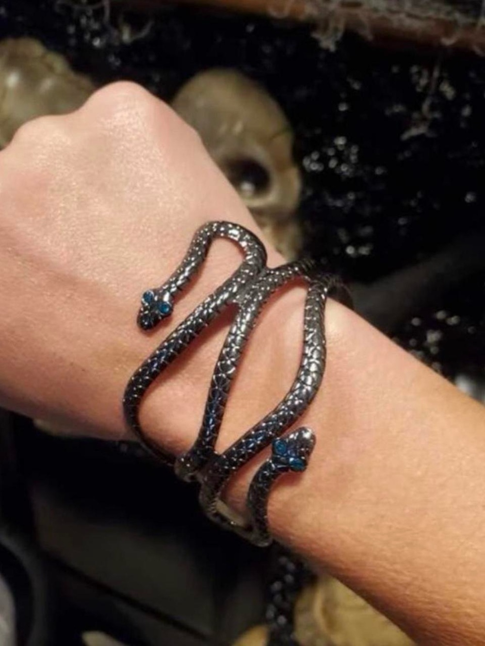 Silver and blue snake arm cuff bracelet.